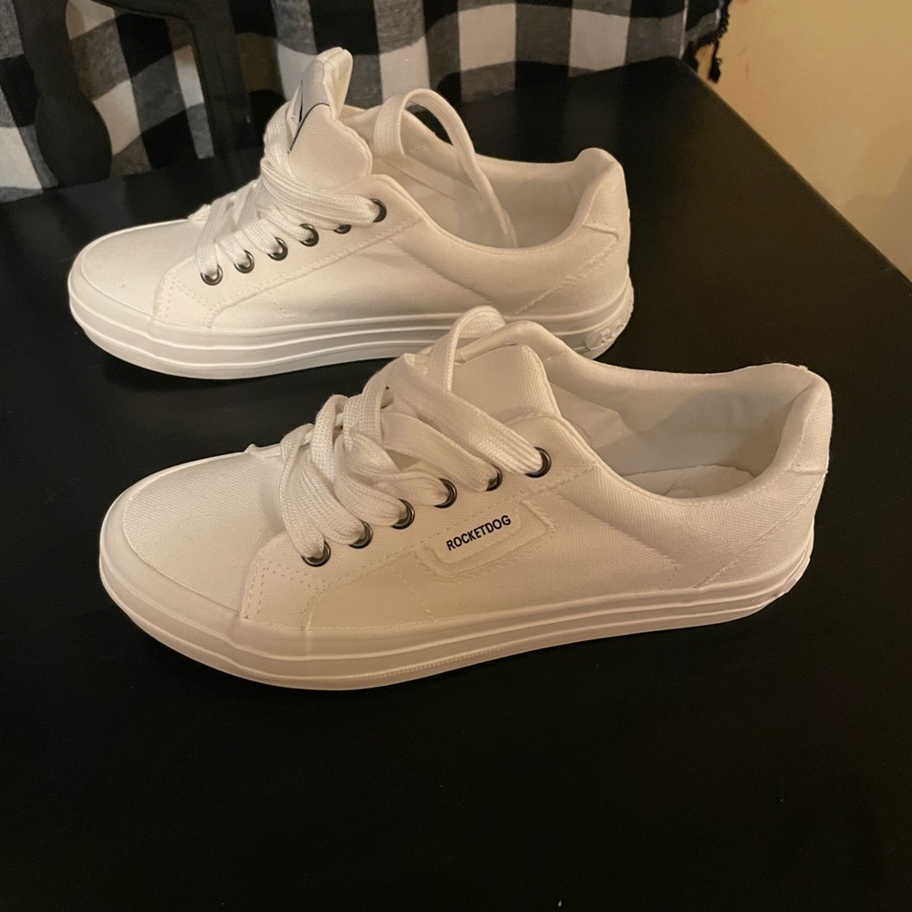 ROCKETDOG Celia sneakers in white. They are a size 7.